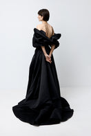 Black volumetric gown by Monetre featuring sculpted, voluminous design and elegant silhouette.