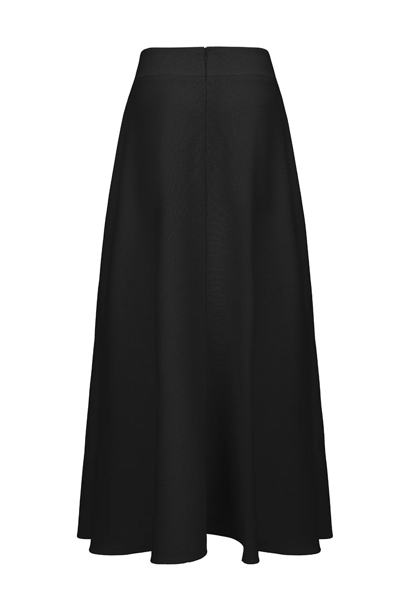 Back view of Nana Jacqueline Blaire black maxi skirt with flowing fabric and elegant design.