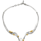 Jude Benhalim Bloom Necklace featuring a delicate floral-inspired design on a thin chain, perfect for elegant accessories.