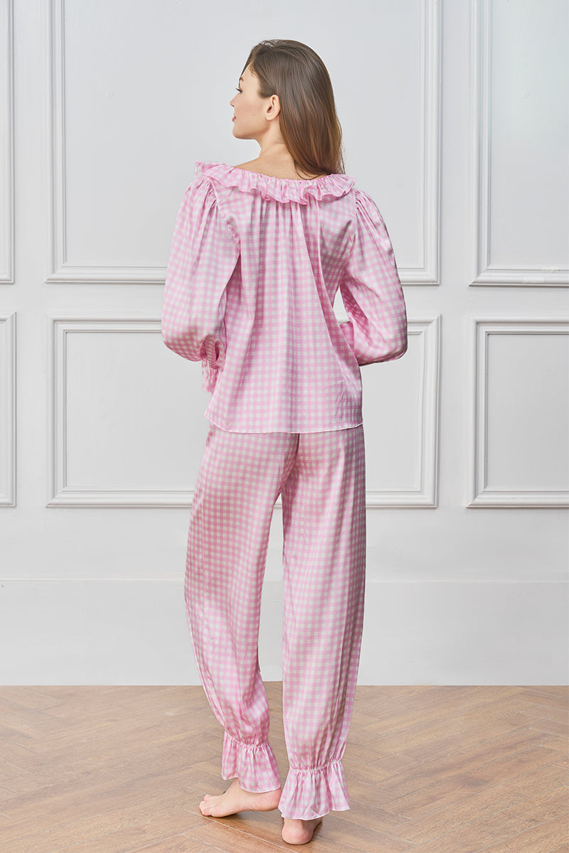 Pink blooming women's pajama set by MANITO, featuring a comfortable, floral-patterned sleepwear ensemble.
