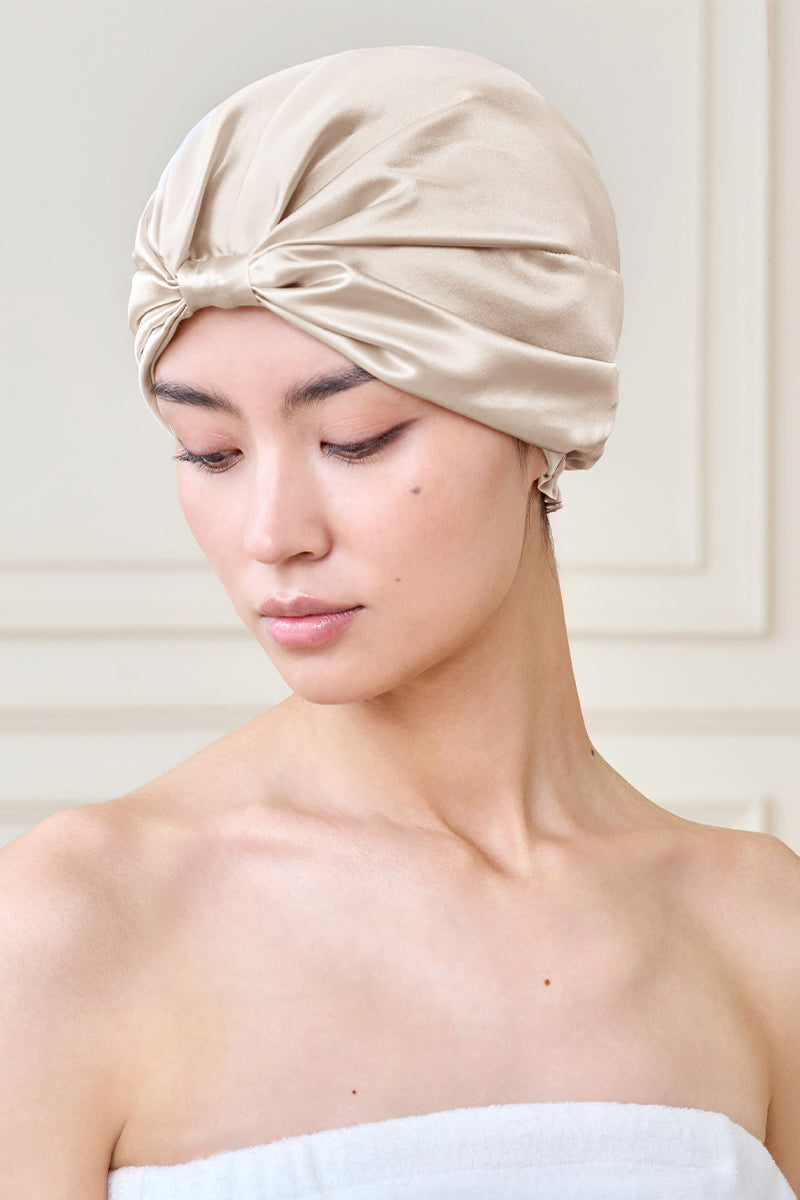 Manito blooming women's silk sleep cap featuring floral designs, soft silk fabric, and a comfortable fit for restful sleep.