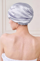 Purple silk sleep cap for women by MANITO, soft and comfortable hat with a blooming floral design for restful nights.