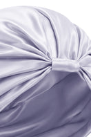 Purple silk sleep cap for women by MANITO, stylish and comfortable hat designed for gentle hair care and nighttime wear.