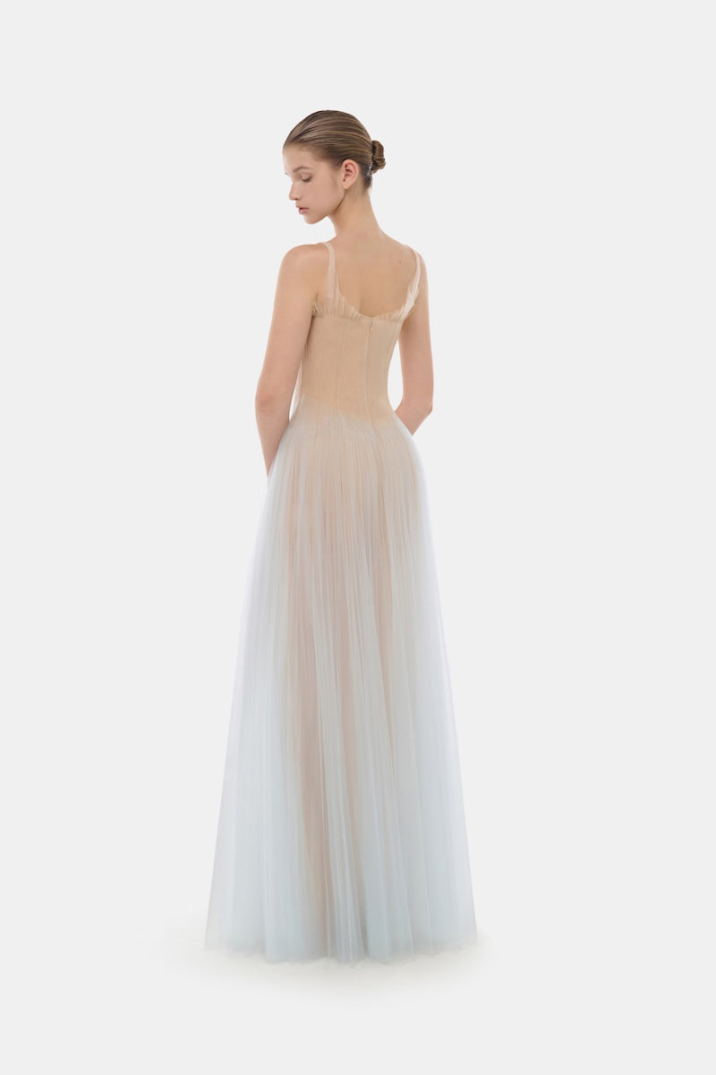 Blue corset tulle gown by Montsand featuring a flowing tulle skirt and fitted bodice, elegant evening dress for formal occasions.