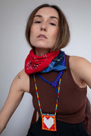 Blue Guardian Snake Necklace by Pájara Pinta featuring a sleek snake design in vibrant blue.