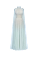 Blue smocked lace maxi dress by Montsand, featuring intricate lace details and a flowing, elegant silhouette.