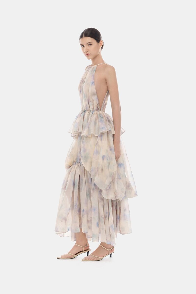Blue tiered halter bubble maxi dress by Montsand, featuring a flowing design with layered fabric and halter neckline.
