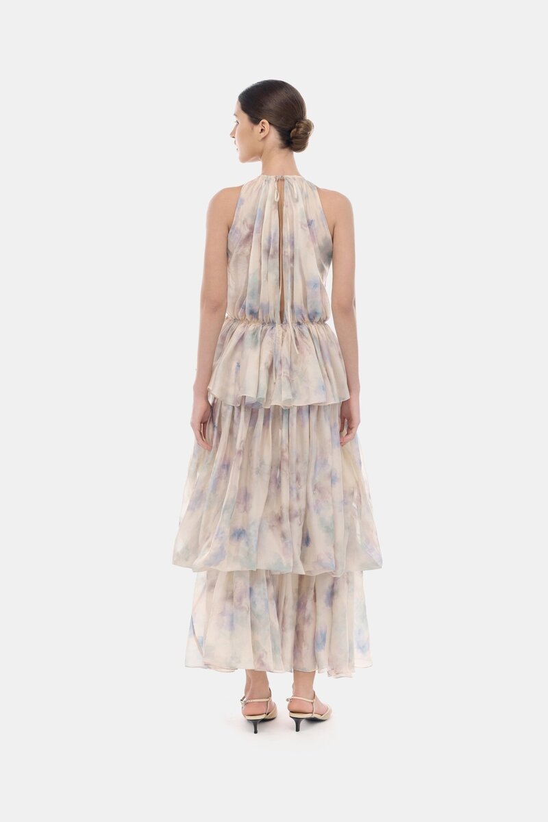Blue tiered halter bubble maxi dress by Montsand, featuring a flowing silhouette and tiered fabric design.