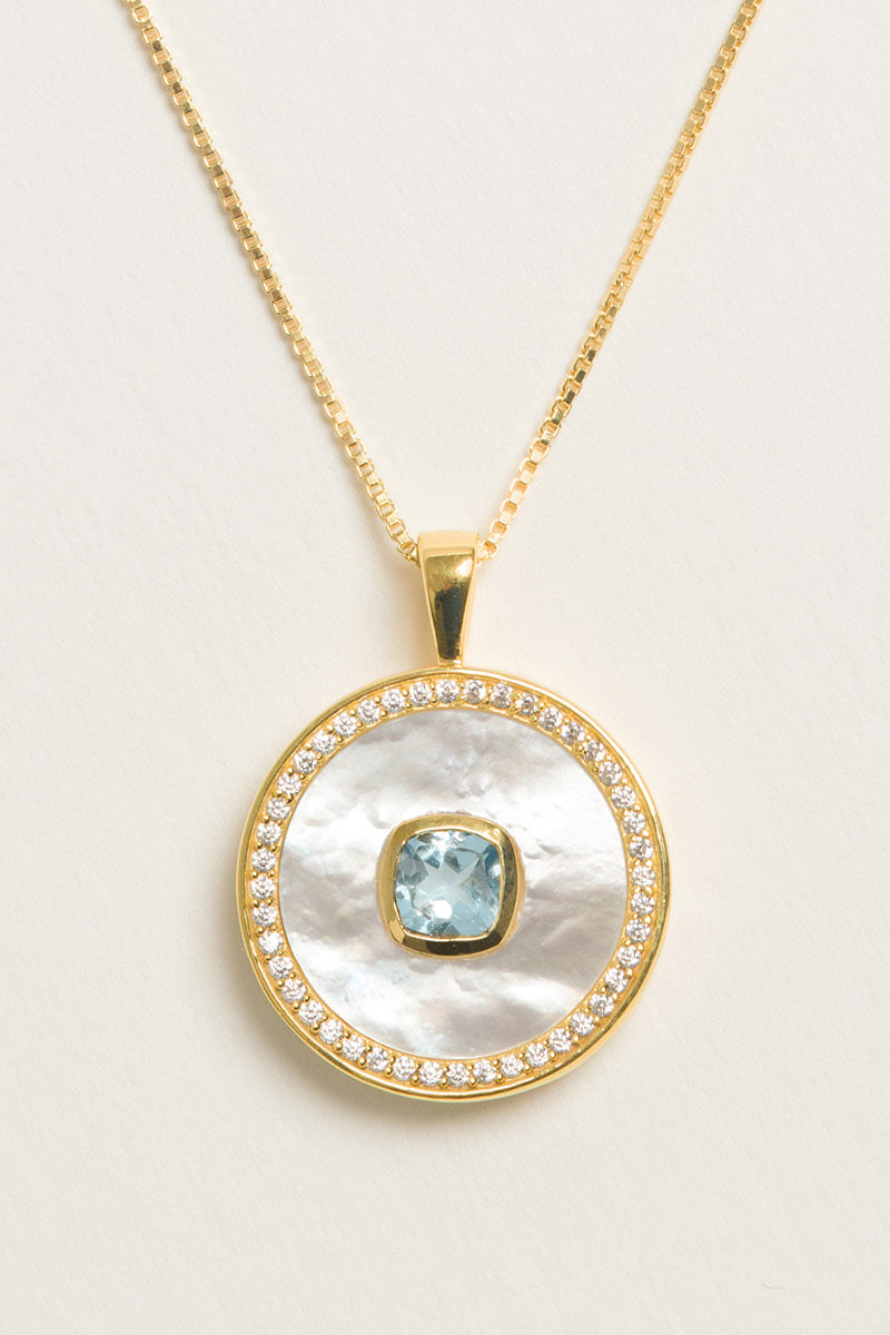 Blue Topaz December birthstone necklace with mother-of-pearl accents, vermeil gold chain, by Freya Rose.