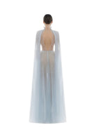 Blue smocked lace maxi dress by Montsand, featuring intricate lace details and a flowing silhouette perfect for elegant occasions.