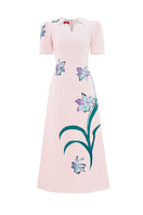 Blush sculpted notched A-line midi dress by Tiny Ink, featuring a fitted bodice and flared skirt, displayed on a hanger.