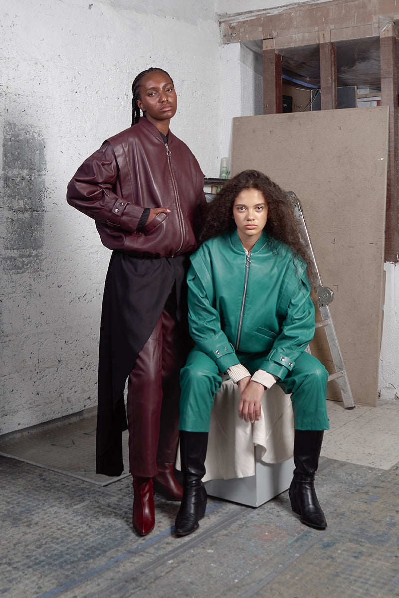 Maz Manuela Álvarez bomber leather jacket in Milano green, showcasing the stylish collar, front zipper, and sleek fit.