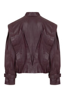 Wine red bomber leather jacket by MAZ Manuela Álvarez, featuring a stylish, fitted design with front zipper and ribbed cuffs.