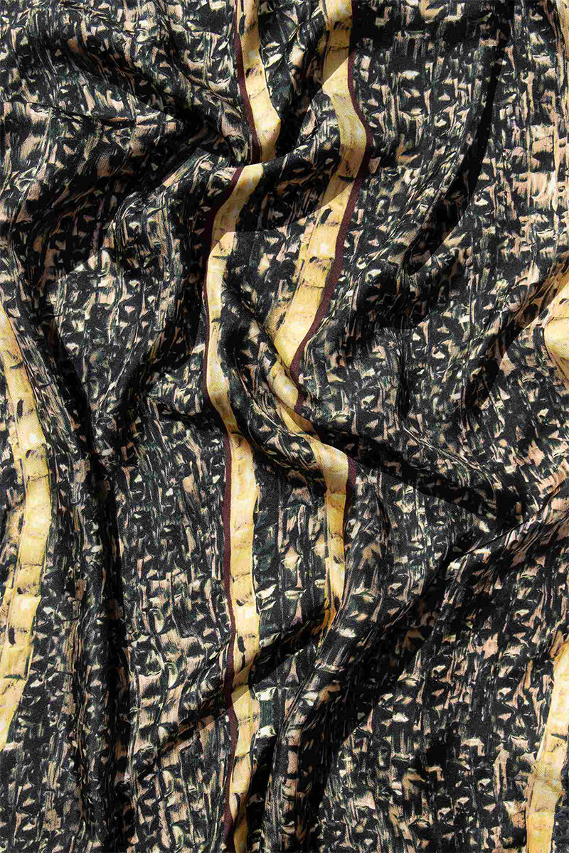 Brocot silk scarf in brown with detailed border, styled as a luxurious stole by Amel Batita, perfect for elegant accessories.