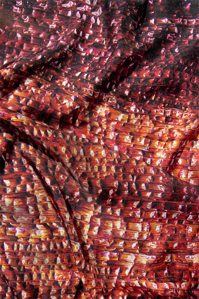 Bordeaux Brocot silk scarf by Amel Batita with intricate pattern and elegant drape, showcasing luxurious fabric and detailed design.