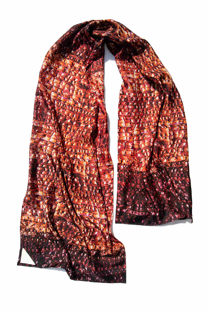 Bordeaux Brocot silk scarf by Amel Batita featuring intricate brocade pattern, draped elegantly on a neutral background.