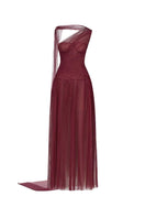 Elegant Bordeaux draped gown by Montsand featuring a flowing maxi design and a rich red color, perfect for formal occasions.