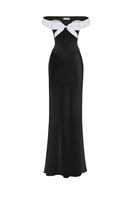 Black bow corset maxi gown by Stolen Stores featuring a structured bustier top and flowing skirt.