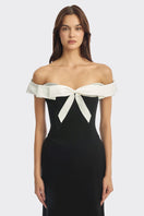 Black bow corset maxi gown by Stolen Stores featuring a fitted bustier style and elegant flowy skirt.