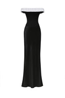 Black bow-corset maxi gown by Stolen Stores featuring a fitted bustier top and flowing skirt, elegant evening wear.