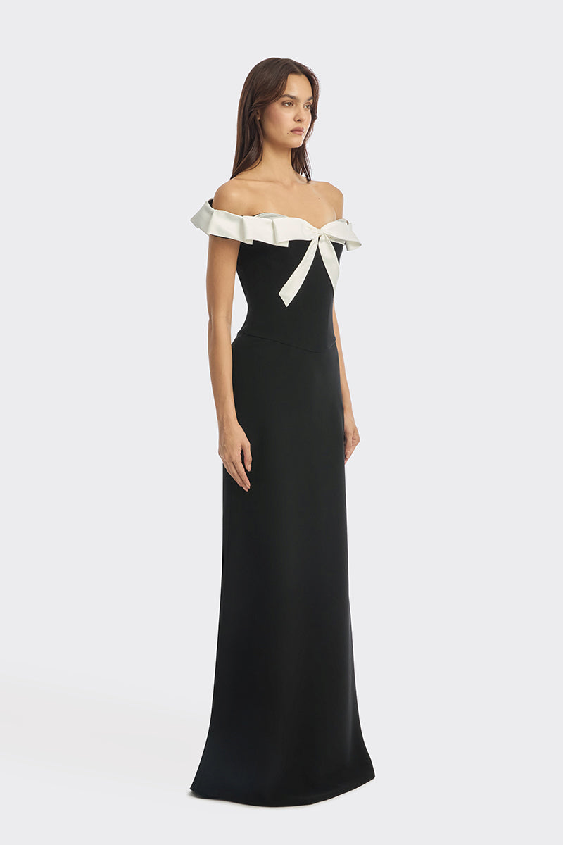 Black bow corset maxi gown by Stolen Stores featuring a fitted bustier style and elegant, flowing skirt.