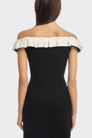 Black bow corset maxi gown by Stolen Stores featuring a fitted bustier style and elegant flowing skirt.