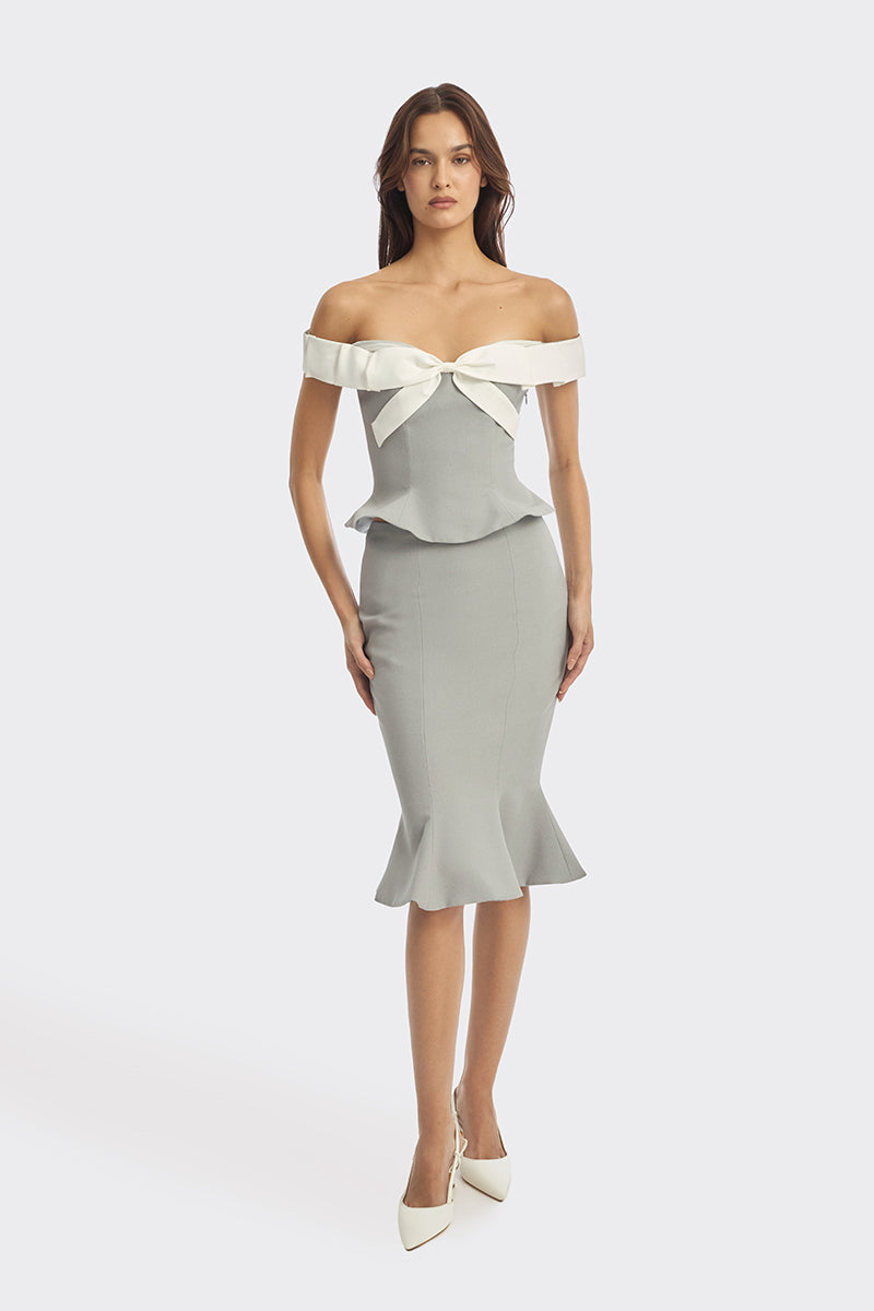 Gray and white bow corset bustier top by Stolen Stores featuring a fitted design and decorative bow detail.