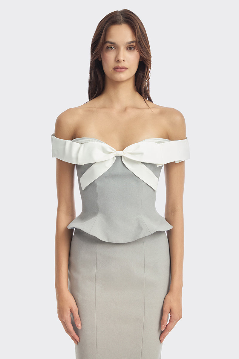 Gray and white bow corset bustier top from Stolen Stores, featuring a fitted design with a decorative front bow.
