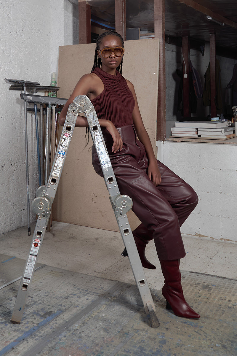 Maz Manuela Álvarez braided furrows top in wine red, stylish shirt with braided details, perfect for casual or dressy outfits.