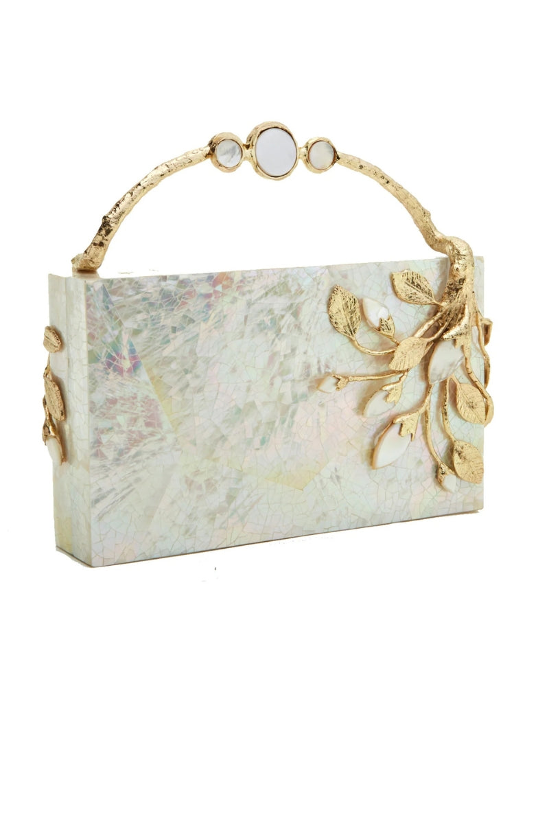 Blue Emm Kuo Brancuse clutch bag with sleek design and textured surface, shown in a close-up image.