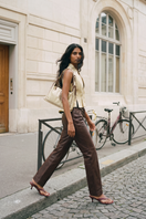 Double A Brianna leather vest in yellow beige, stylish sleeveless women's vest with a smooth leather finish.