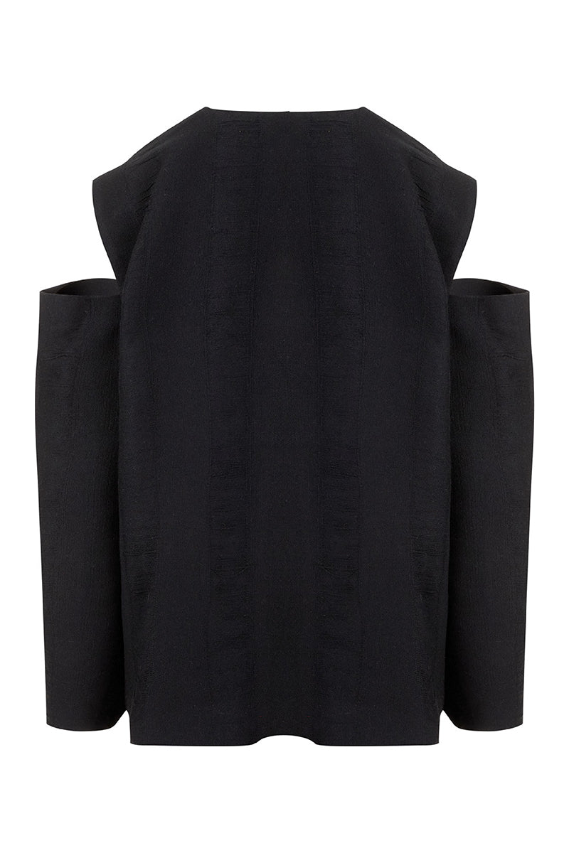 Black Bridge Weave blazer suit by MAZ Manuela Álvarez, featuring tailored fit and classic design, shown on a model.