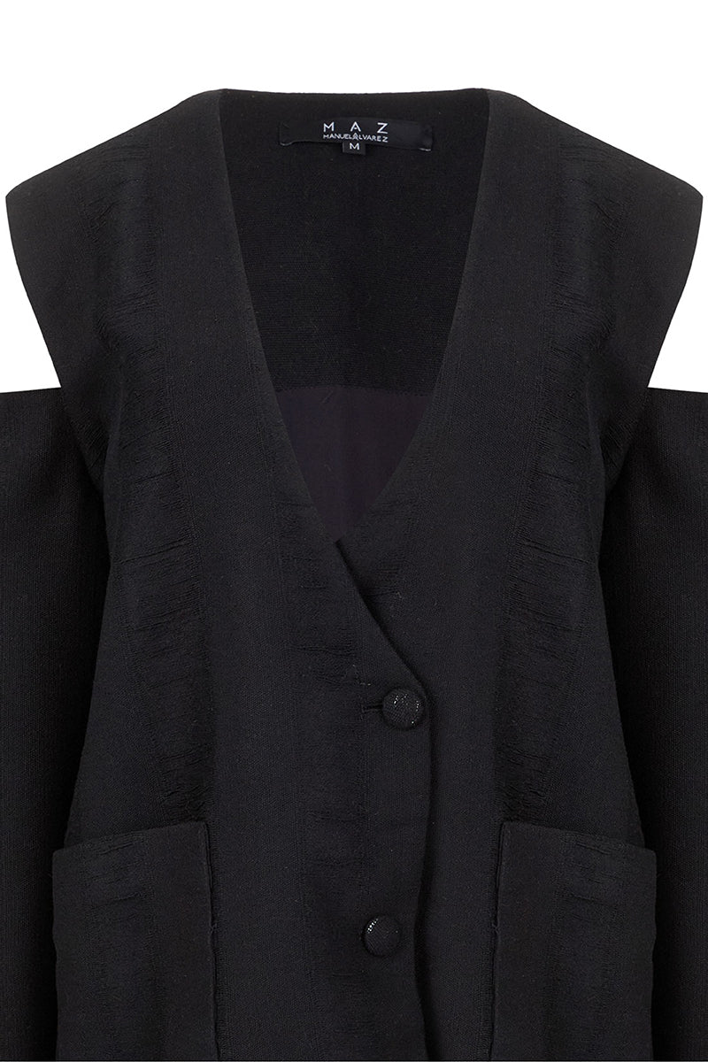 Black bridge weave blazer suit by MAZ Manuela Álvarez, tailored fit with detailed weave pattern, front buttons, and classic lapel.