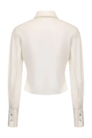 White Bridget top from Nana Jacqueline showing the back view with a clean, stylish design and subtle detailing.