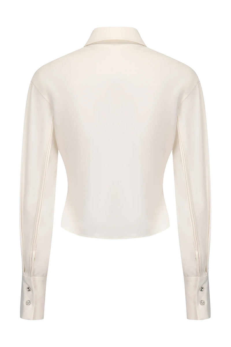 White Bridget top from Nana Jacqueline showing the back view with a clean, stylish design and subtle detailing.
