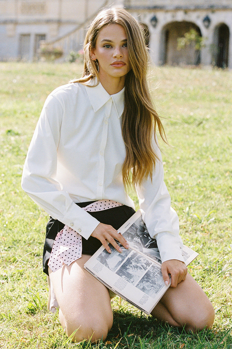 White Bridget top by Nana Jacqueline featuring a stylish, fitted design with a round neckline and short sleeves.