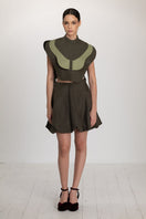 Lichen green mini skirt by ANA + MARIA, featuring a stylish fit and smooth fabric, shown in a high-resolution image.