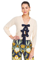 Mestiza New York Brigitta bow cardigan in ivory, soft knit sweater with bow details, long sleeves, and a cozy fit.