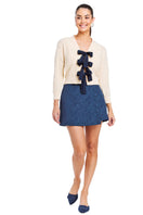 Ivory Brigitta bow cardigan sweater by Mestiza New York, featuring a feminine design with bow accents and a cozy fit.
