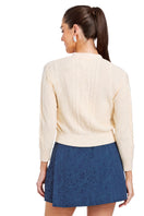 Mestiza New York Brigitta ivory bow cardigan sweater featuring a soft knit fabric and a stylish bow detail at the front.