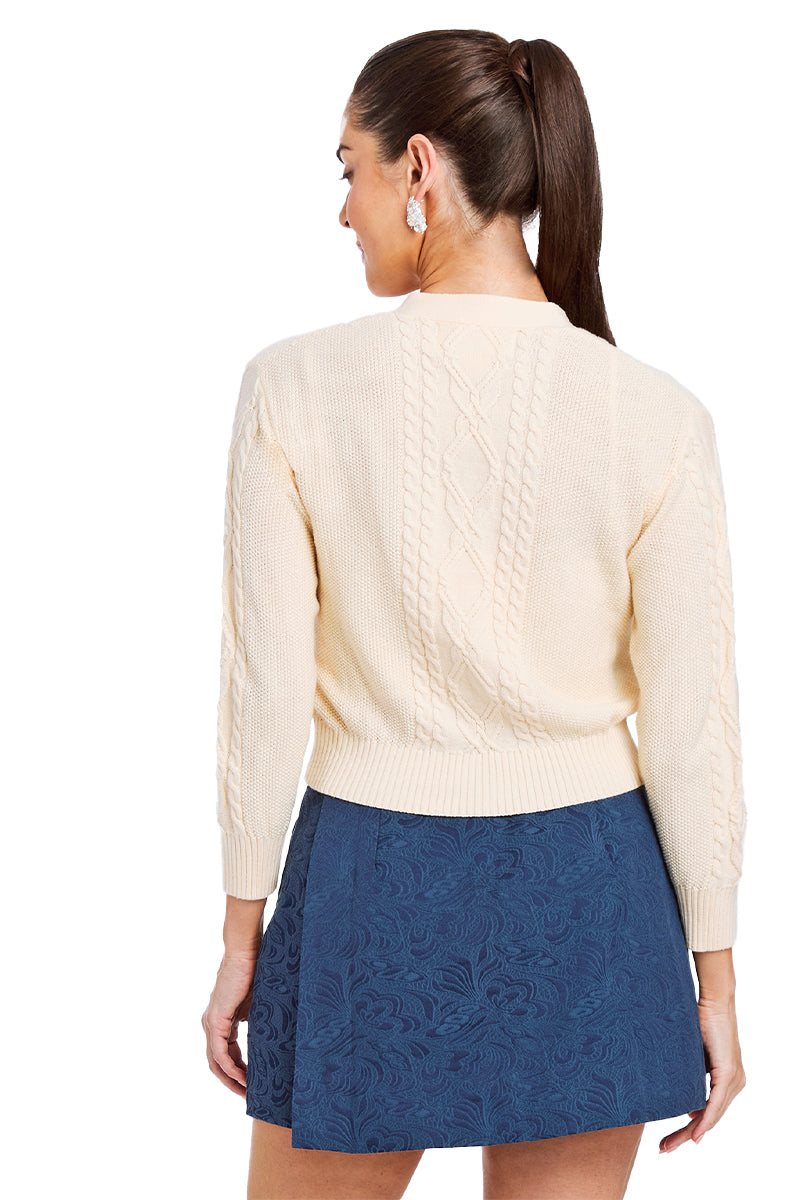 Mestiza New York Brigitta ivory bow cardigan sweater featuring a soft knit fabric and a stylish bow detail at the front.