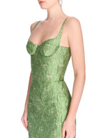 Montsand brocade bamboo maxi gown featuring intricate pattern and flowing silhouette, perfect for elegant occasions.