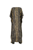 Brown Brocot kaftan maxi dress by Amel Batita with flowing fabric and intricate patterns, perfect for elegant summer wear.