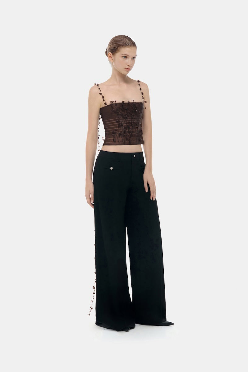 Brown 3D floral strap top by Montsand, featuring textured fabric and adjustable straps, styled for casual or summer wear.