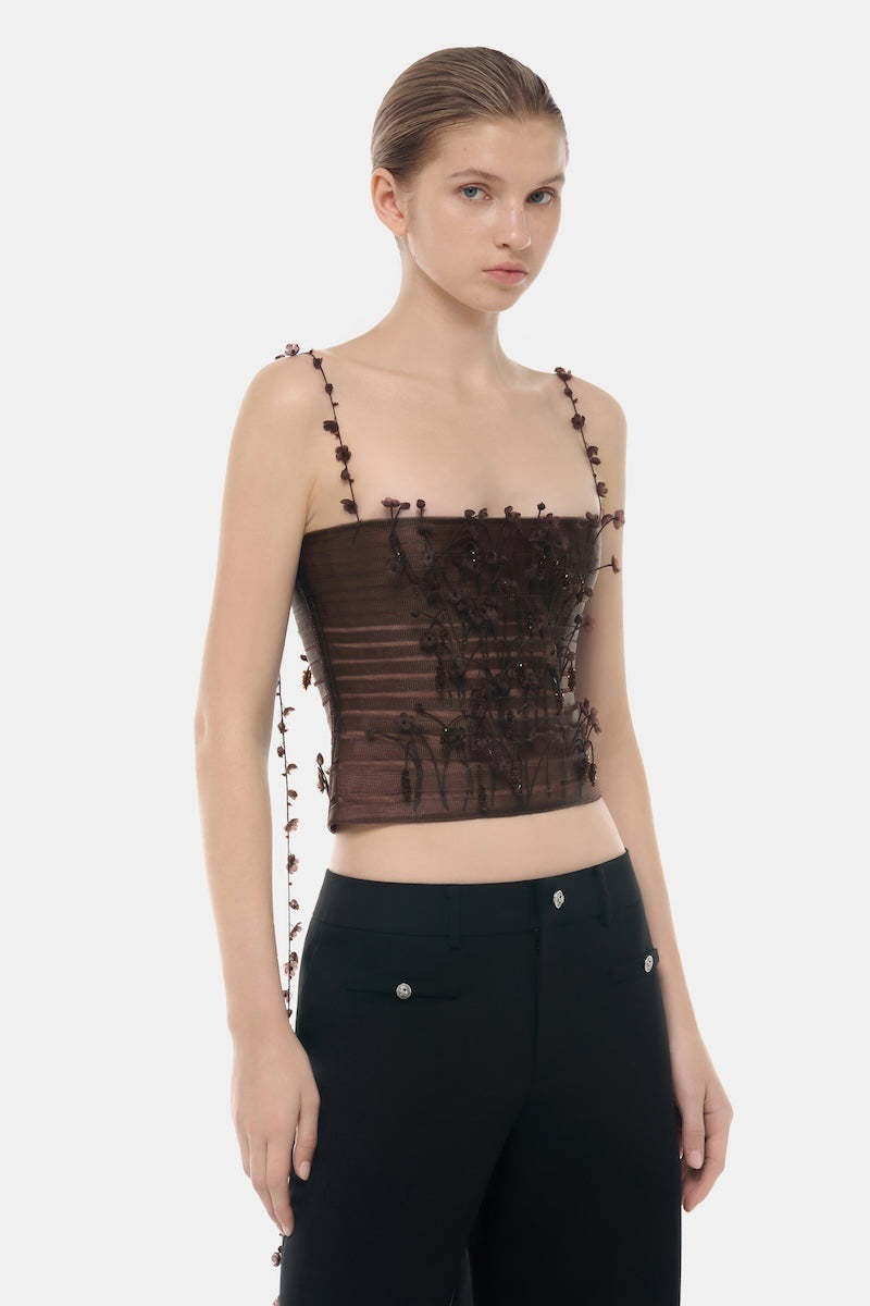 Brown 3D floral strap top by Montsand, featuring textured fabric and stylish spaghetti straps, perfect for casual wear.