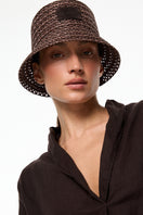 Brown bucket hat by LE SH KA featuring a classic wide-brim design in soft brown fabric.