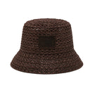 Brown bucket hat by LE SH KA featuring a classic wide-brim design, perfect for sun protection and casual style.