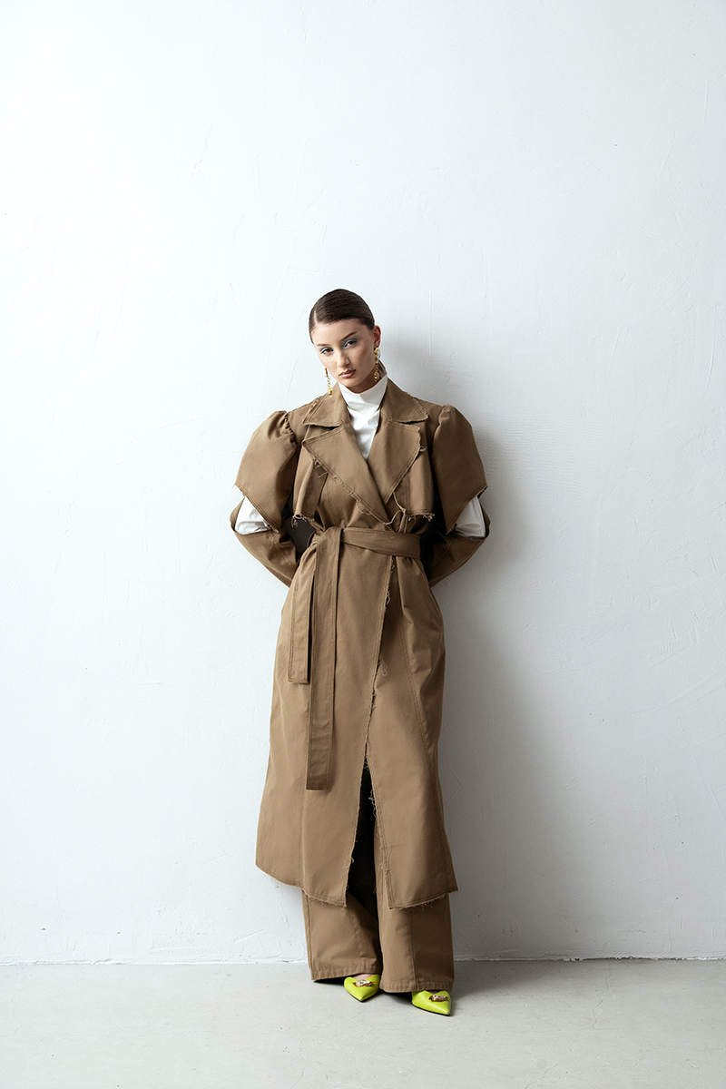 Liya belted puff-sleeve trench coat in brown, stylish design with a waist belt and classic trench silhouette.