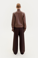 Brown bomber jacket in fox leather by ELENAREVA, shown on a model with front view and stylish fit.
