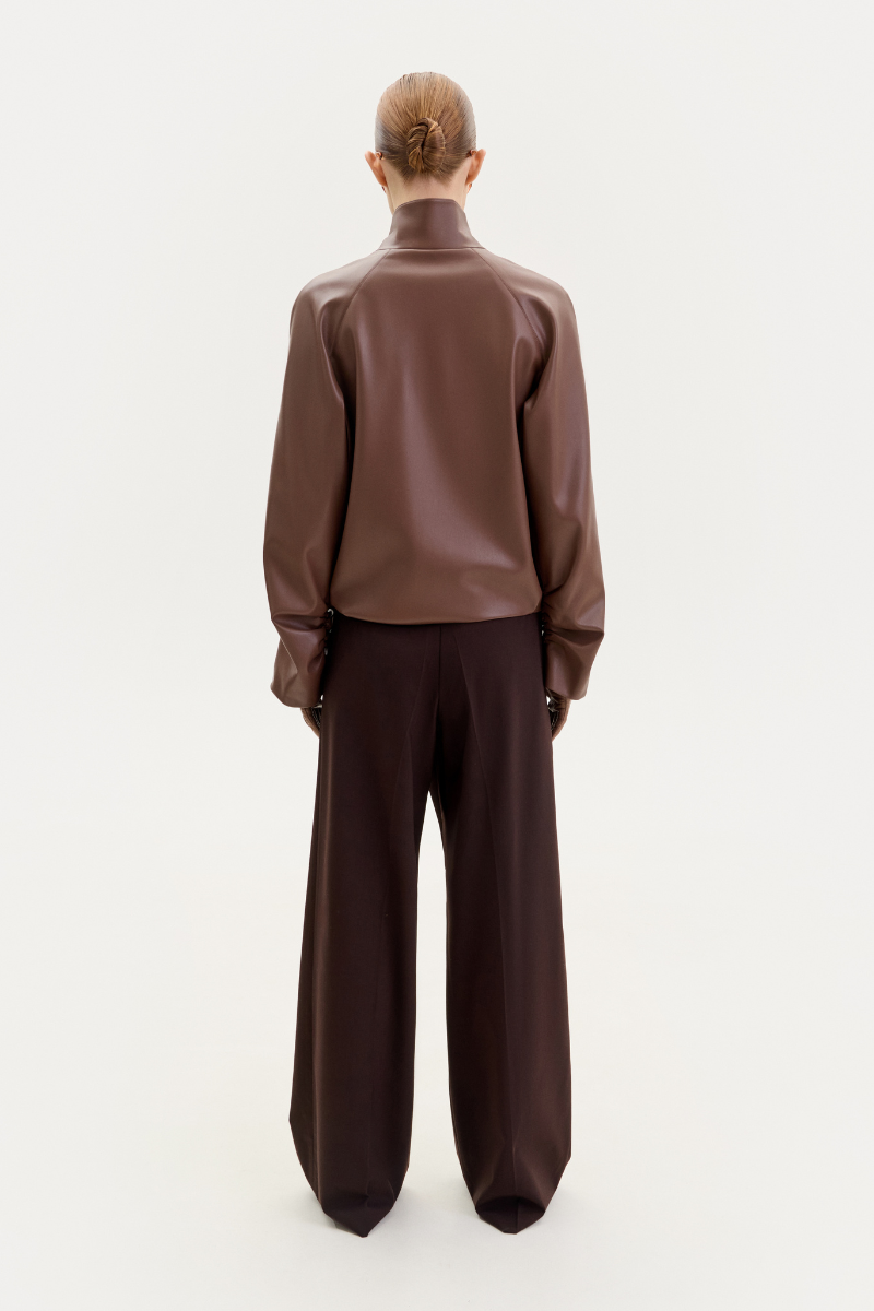 Brown bomber jacket in fox leather by ELENAREVA, shown on a model with front view and stylish fit.